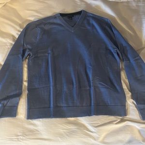 Blue V-neck sweater